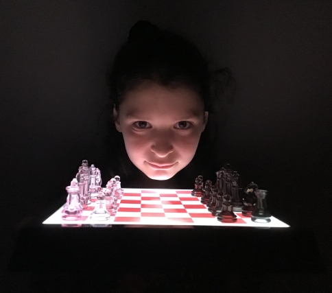 Larissa plays in Brentwood School Invitational Chess Tournament
